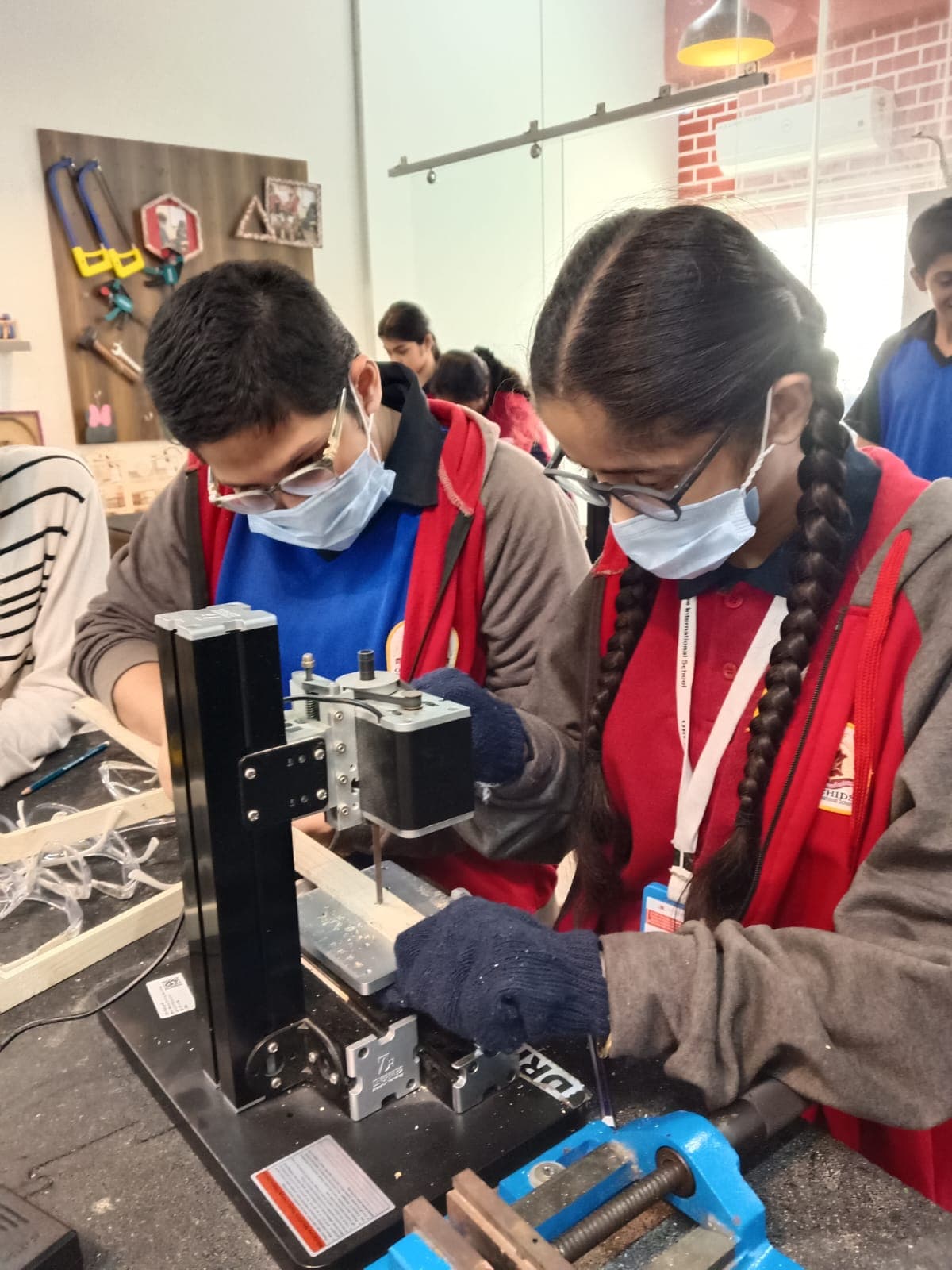 DIY Engineering students building a life-size pinball game